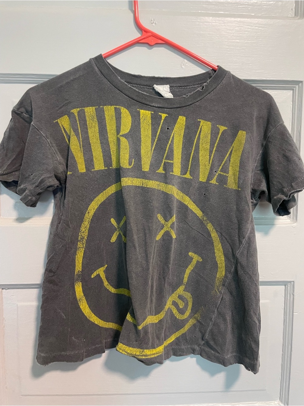 MadeWorn Black Nirvana Graphic Tee with Yellow Smile Logo cropped style